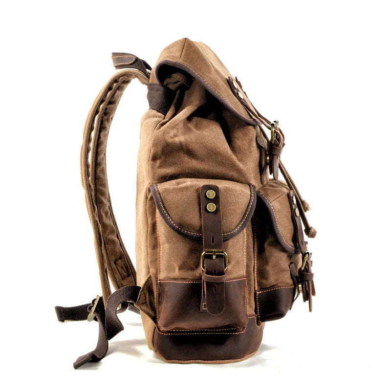 Femlion Vintage Waterproof Canvas Backpack for Men with Large Capacity