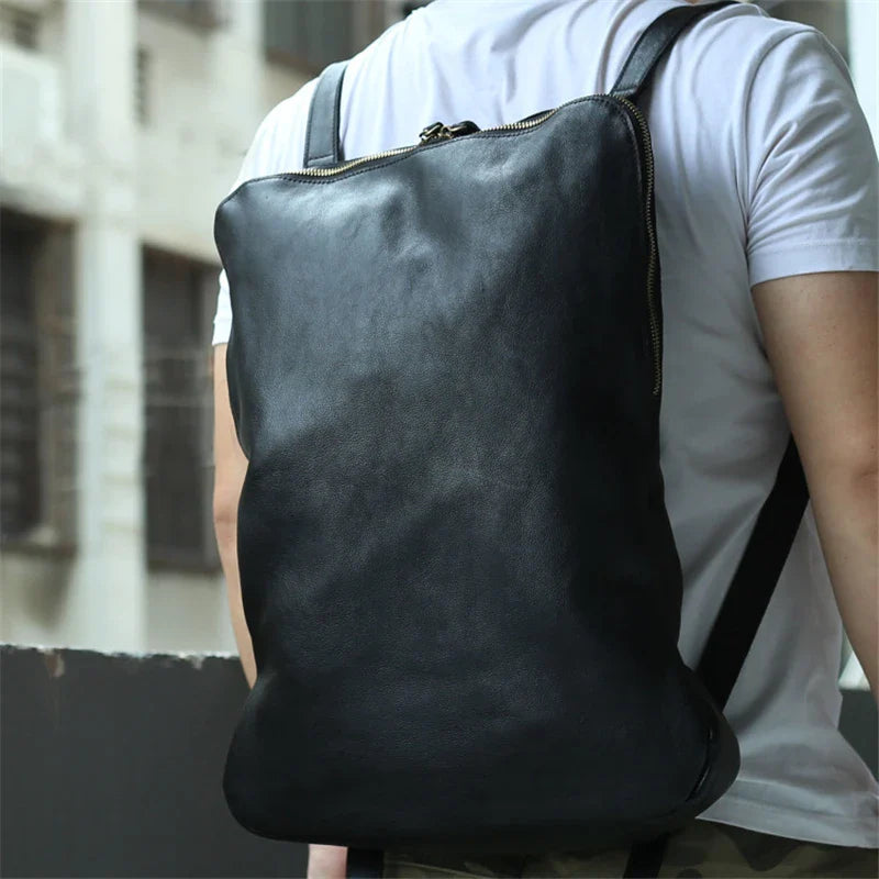 Femlion Leather Backpack for Men: Classic Black Travel Bagpack for School and Travel