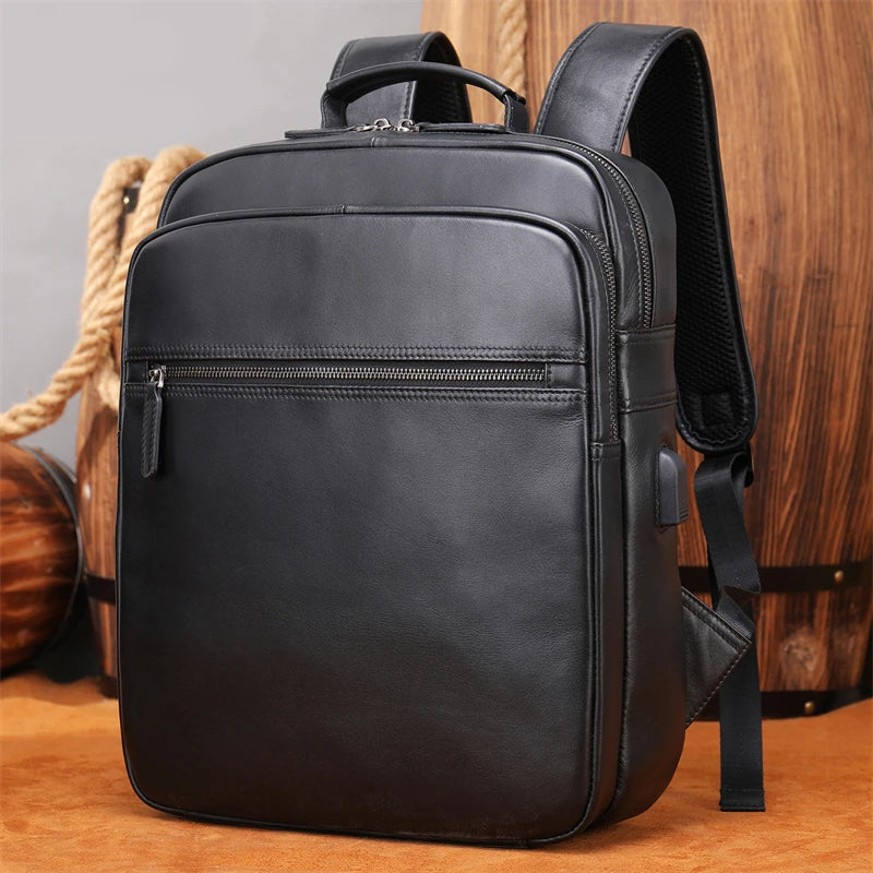 Femlion Black Leather Laptop Backpack for Men - High Capacity 14-inch Genuine Cowskin Daypack