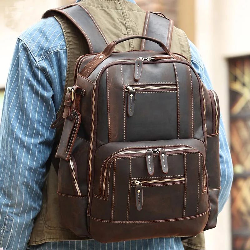 Femlion Men's Genuine Leather Luxury Backpack with Large Capacity for Travel and Laptop