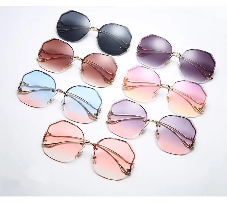 Femlion Gradient Round Sunglasses Women Rimless Metal Temples UV400