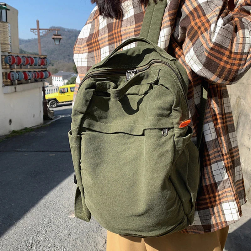 Femlion Canvas Backpack: Casual Solid Color Daypack with Large Capacity