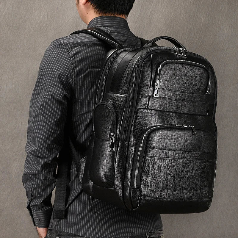 Femlion Double Layer Leather Backpack for Men: Large Capacity Business & Travel Laptop Bag