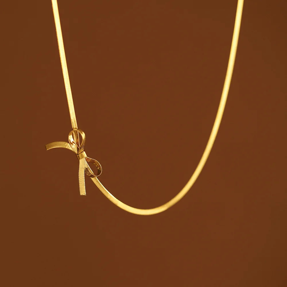 Femlion Minimalist Knot Bow Choker in 18k Gold Plated Stainless Steel