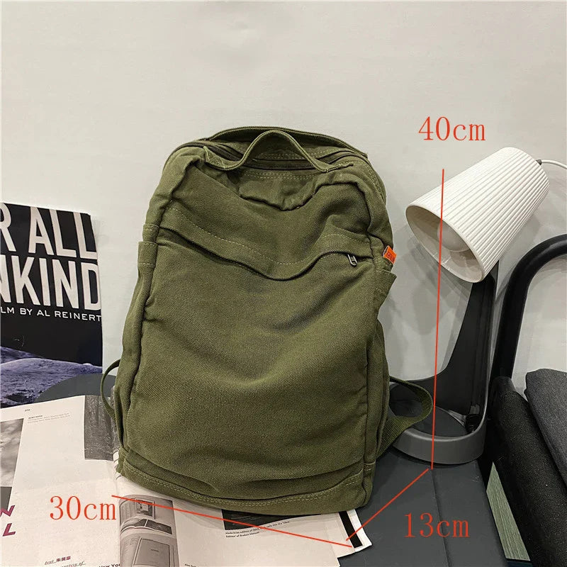 Femlion Canvas Backpack: Casual Solid Color Daypack with Large Capacity