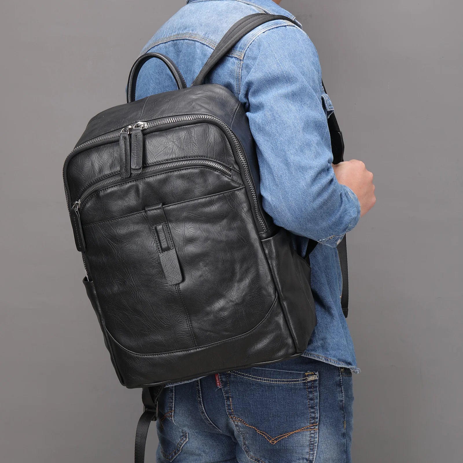 Femlion Black Leather Men's Backpack: Casual Travel Daypack for 14" Laptop